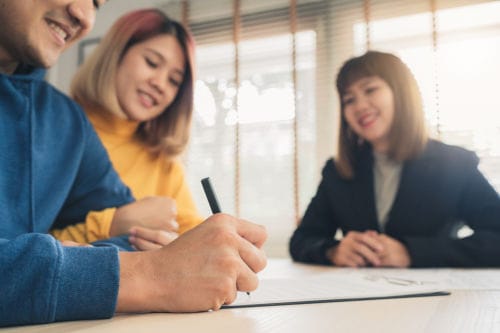 business broker with couple