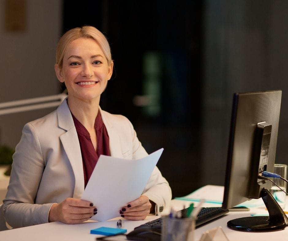 Broker Near Me | woman at her desk